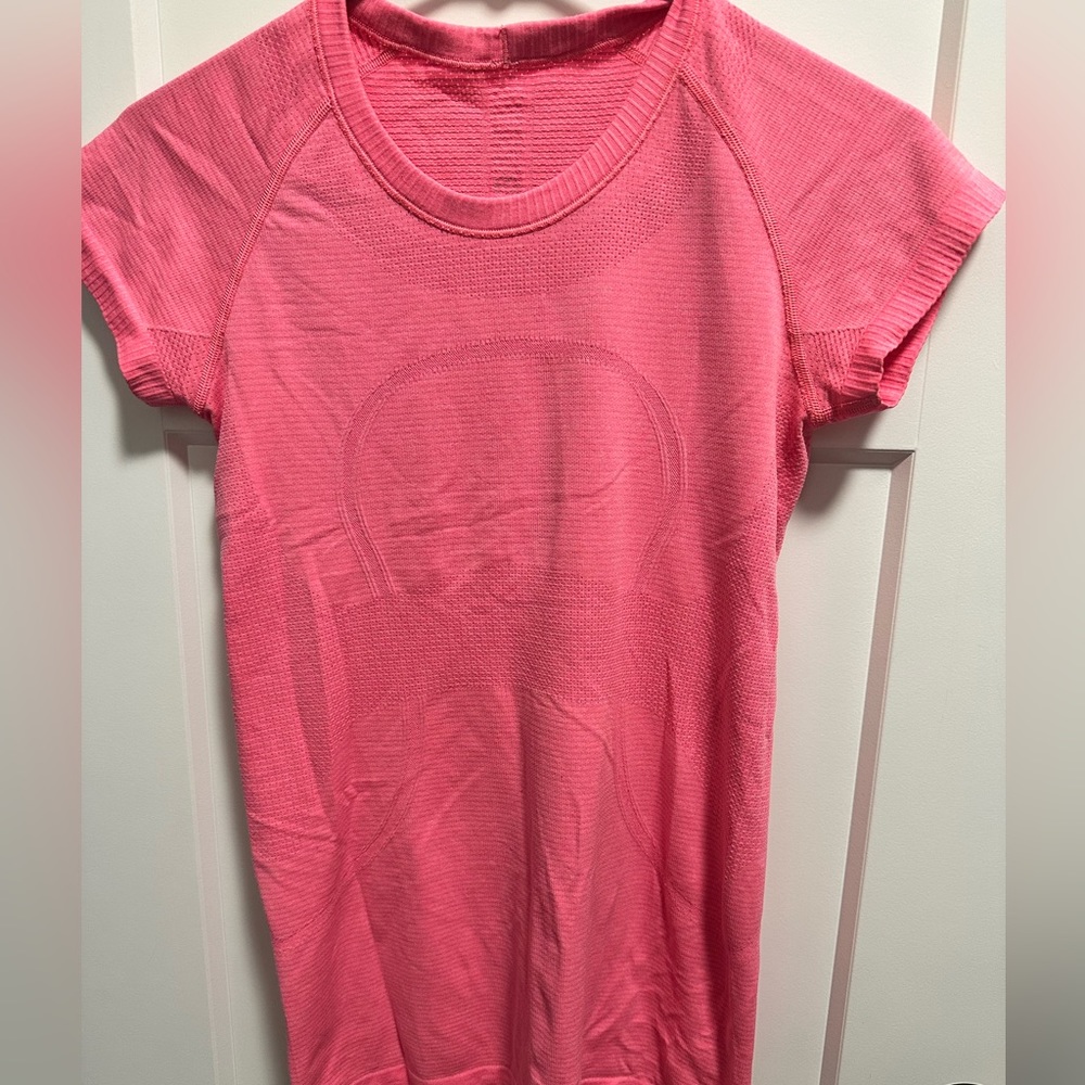 Lululemon size 6 swiftly tech shirt.  Pink